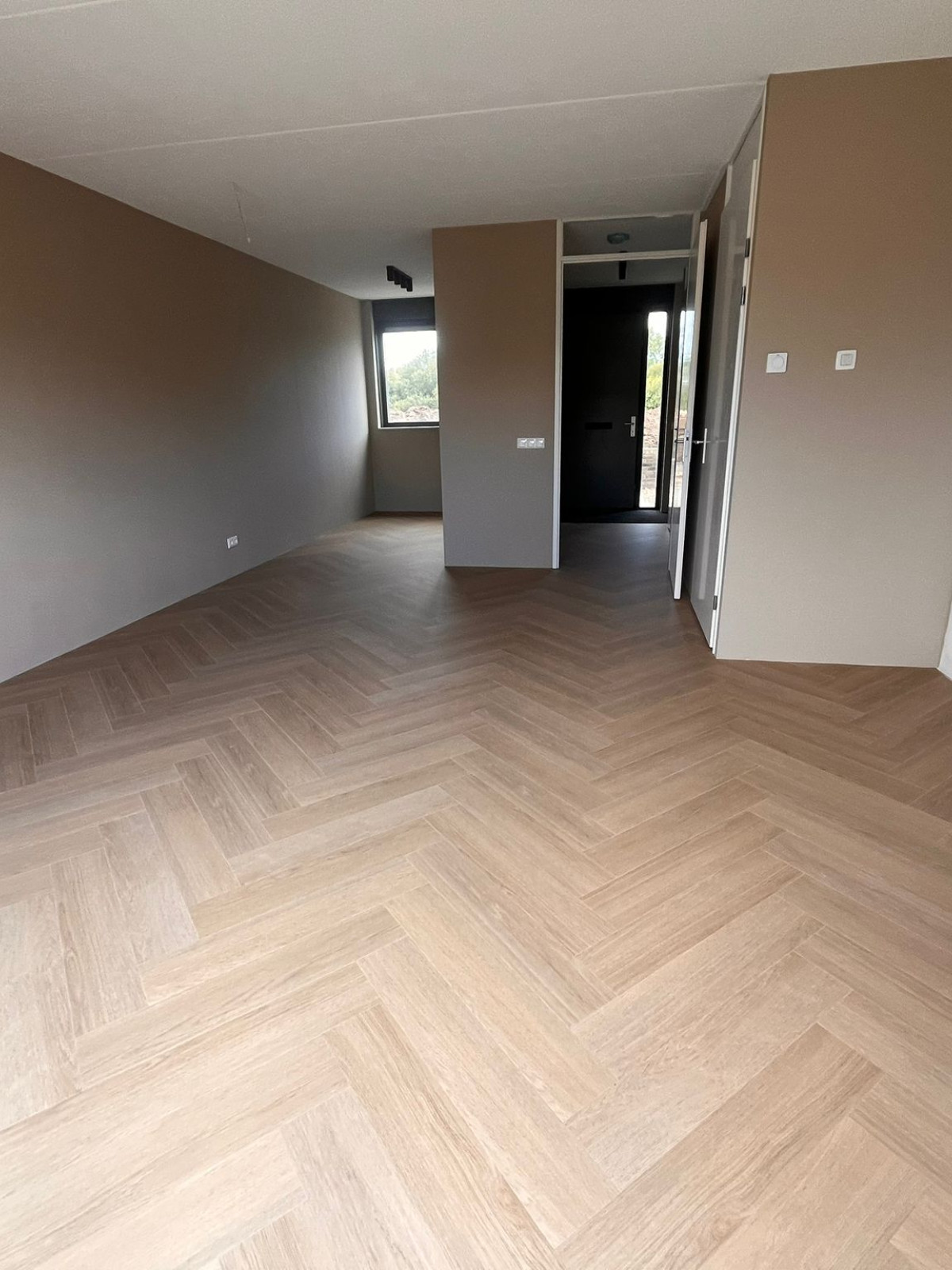 Visgraat vloer van Belakos